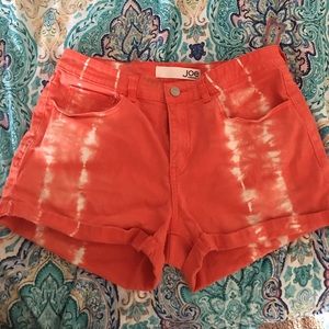 Summery Orange and white shorts.